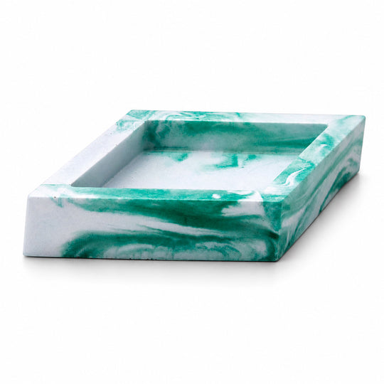 Marble-patterned square tray with green and white swirled design on a white background
