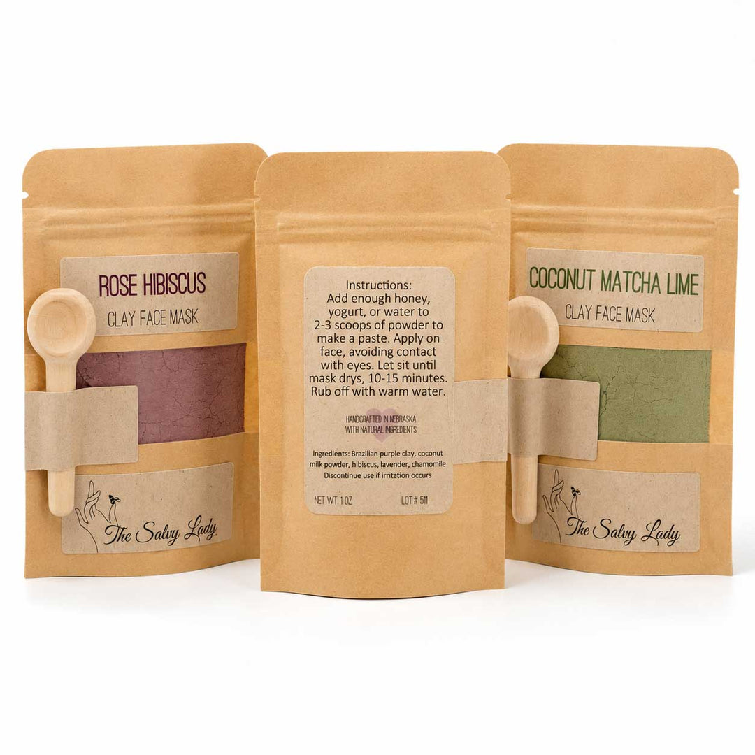 Three packages of clay face masks from The Salty Lady on a white background