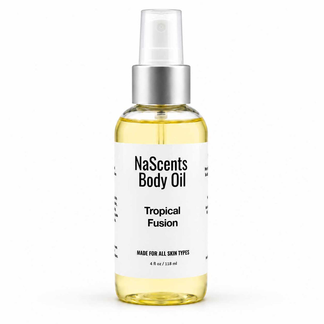 A bottle of NaScents Body Oil in the Tropical Fusion scent, featuring a clear spray top, silver collar, and a white label with black text, set against a plain white background.