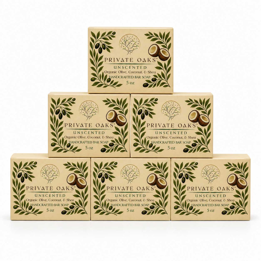 Six boxes of Private Oaks Unscented Organic Olive, Coconut, and Tea Unscented Bar Soap arranged in a pyramid stack on a white background.