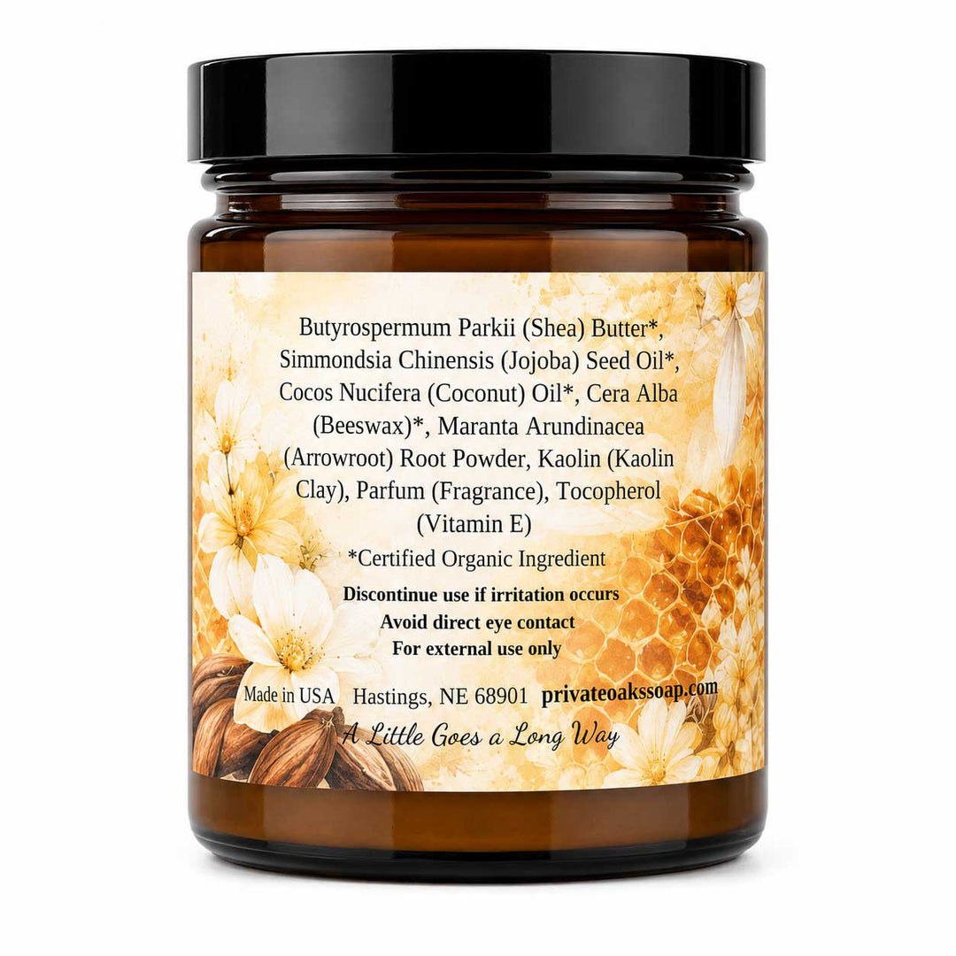 An amber glass jar of Privato by Oak Soap Shea Butter cleansing balm, featuring a white and yellow floral label with text detailing ingredients and usage, set against a plain white background.