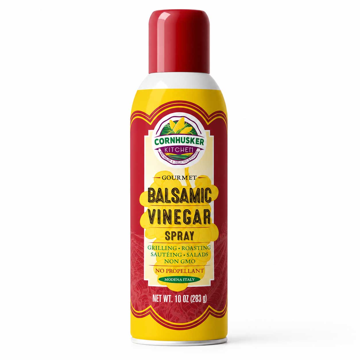 A 10 oz can of Cornhusker Kitchen Gourmet Balsamic Vinegar Spray, featuring a red cap, yellow and red label, and white base on a clean white background.