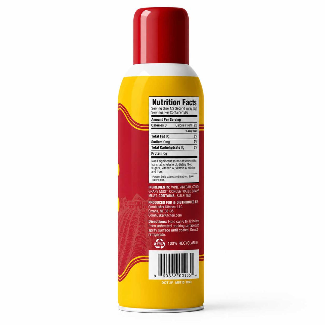 A single aerosol can shown from the back on a clean white background. The can has a red cap, a yellow body, red graphic bands, and a visible Nutrition Facts label with product text including 'Nutrition Facts' and 'Calories per serving'.