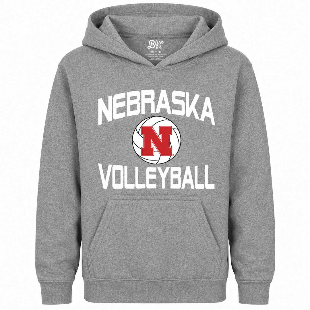 A heather gray pullover hoodie featuring a 'Nebraska Volleyball' graphic on the chest. The design includes the word 'NEBRASKA' in white arched text above a volleyball graphic with a red 'N' logo, and 'VOLLEYBALL' in white text below.