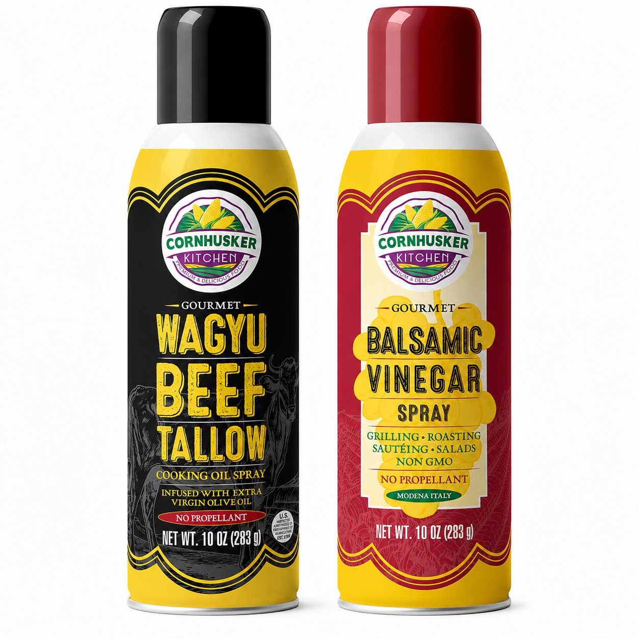 Two Cornhusker Kitchen spray cans on a white background: Wagyu Beef Tallow cooking oil spray with a black label and yellow can, and Balsamic Vinegar Spray with a red label and yellow can.