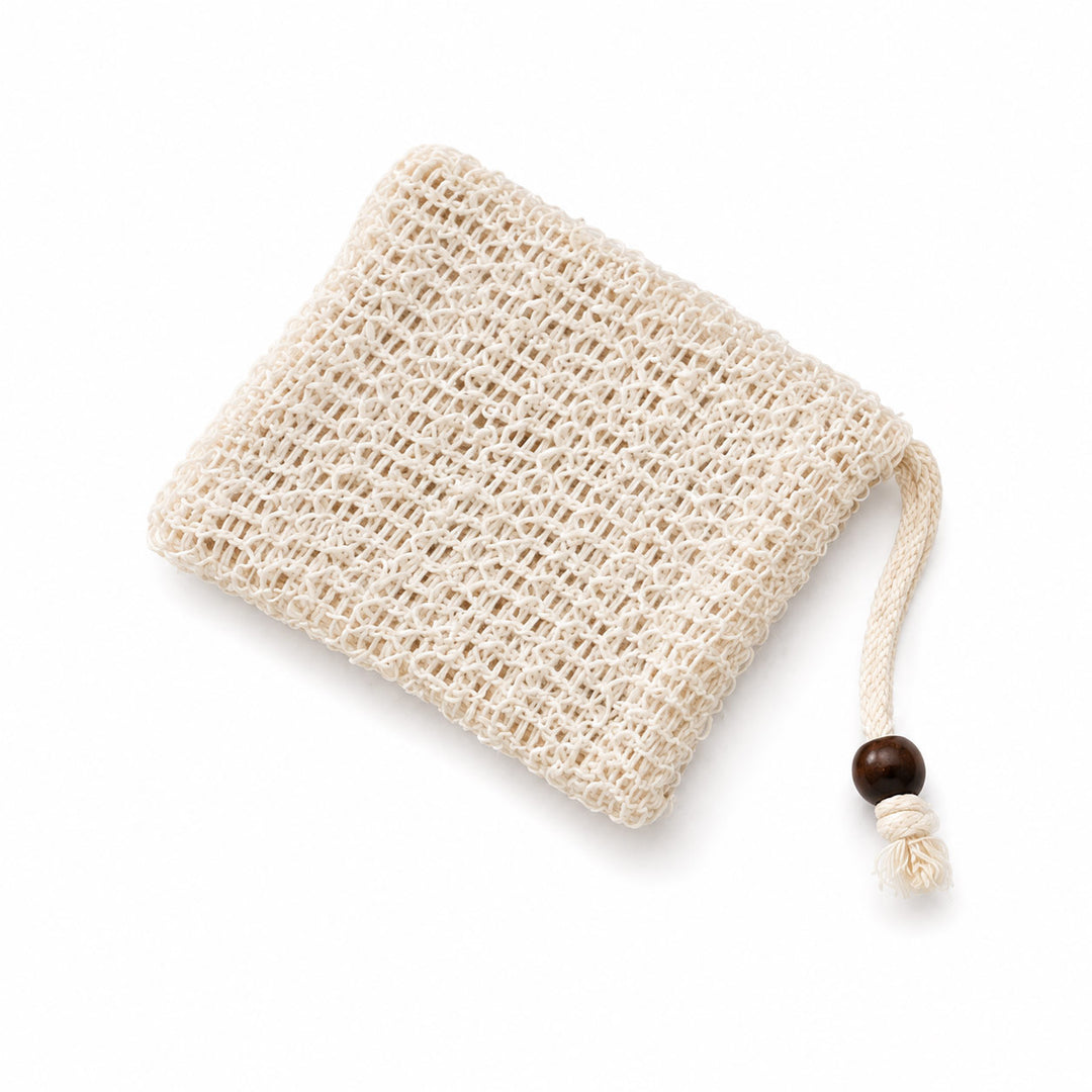 A square cream-colored cotton mesh bag with a drawstring cord and a dark brown wooden bead, shown on a clean white background.