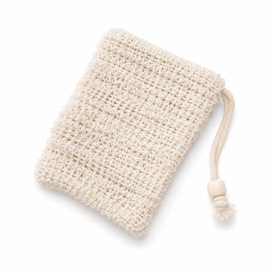 A cream-colored, hand-woven cotton cleaning sponge bag with a drawstring closure and a wooden bead accent, shown on a plain white background.