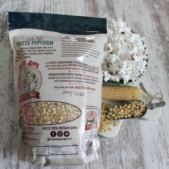 Package of Freeda Day Popcorn with popcorn and corn on a wooden surface