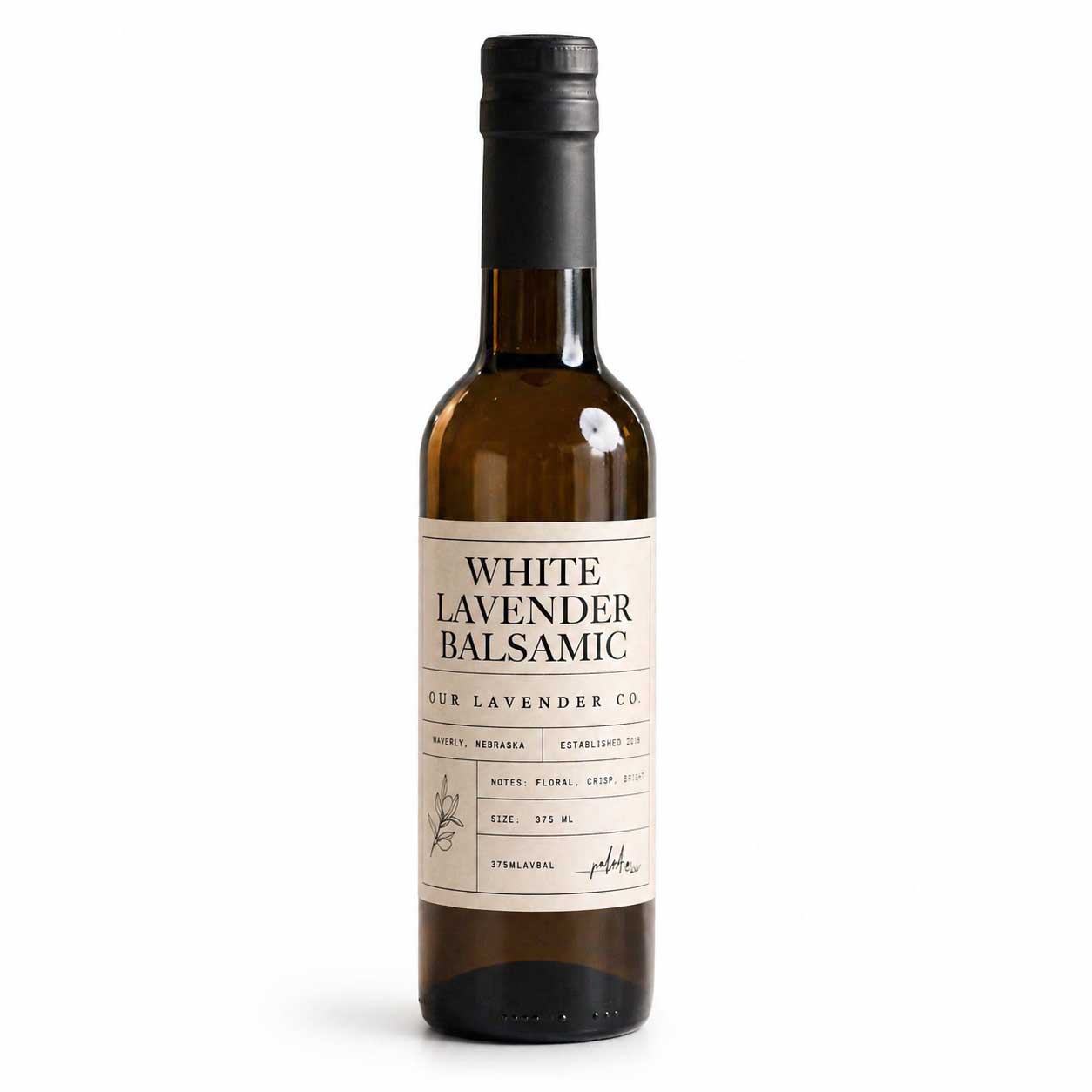 Bottle of White Lavender Balsamic on a white background