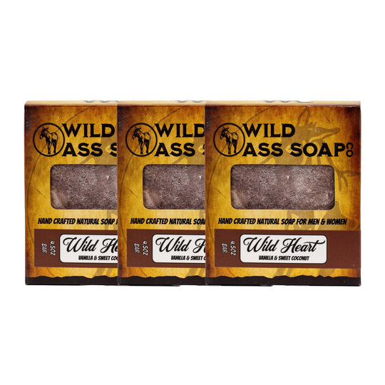 Three bars of Wild Ass Soap in packaging on a white background
