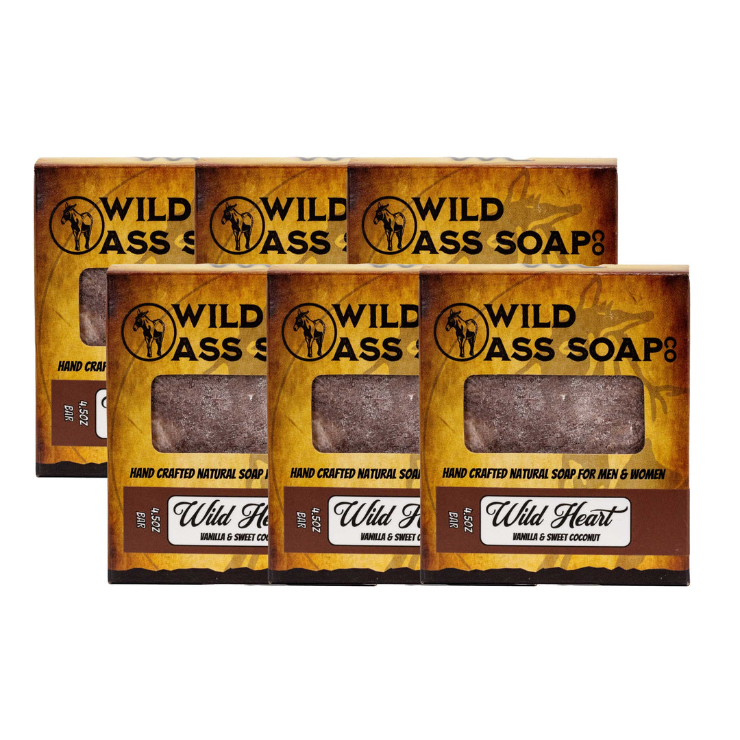 Multiple bars of Wild Ass Soap with packaging on a white background