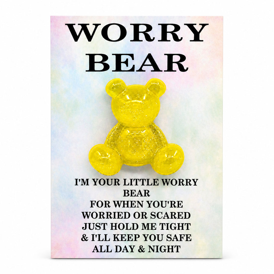Yellow teddy bear with text on a colorful background