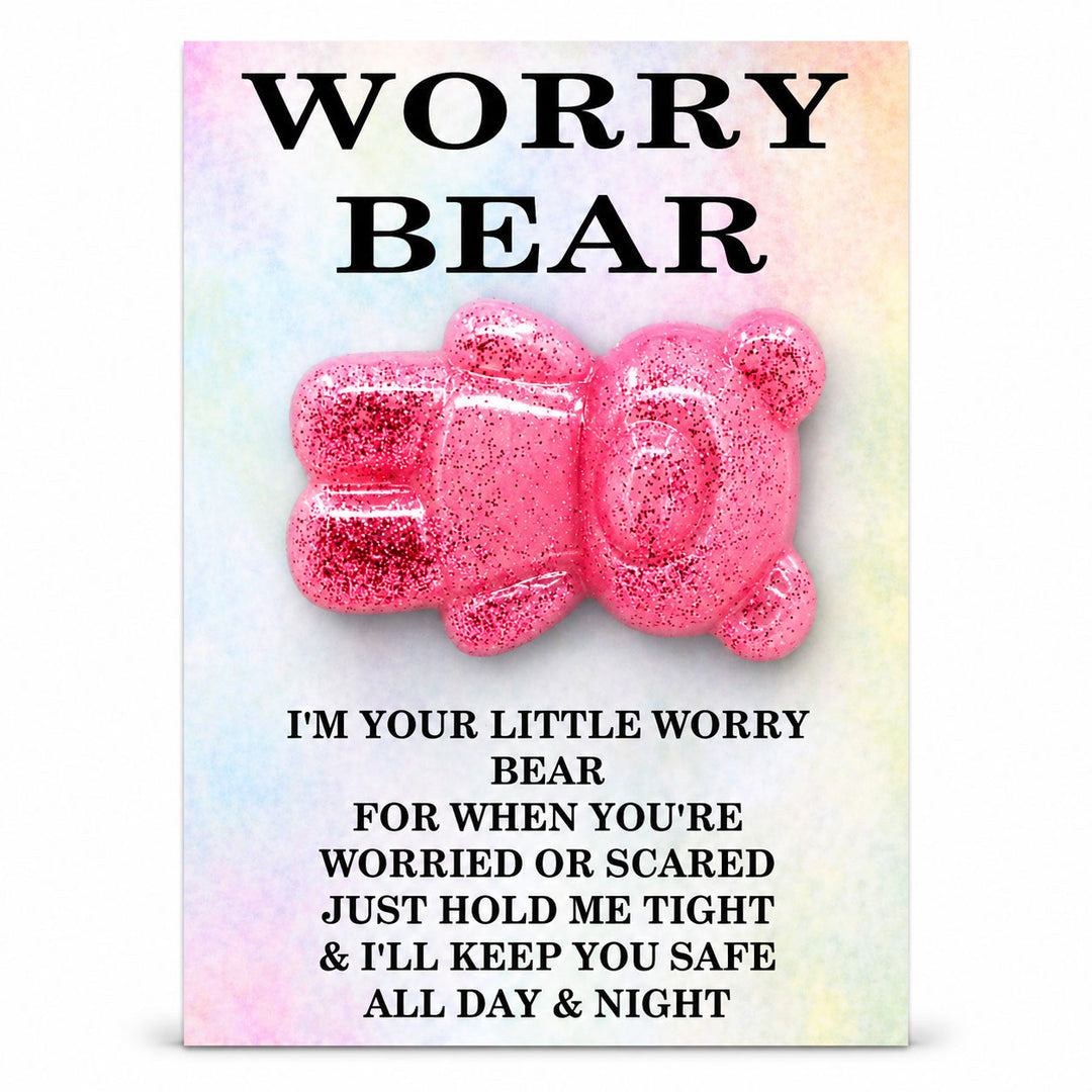 Pink glittery bear with text on a colorful background