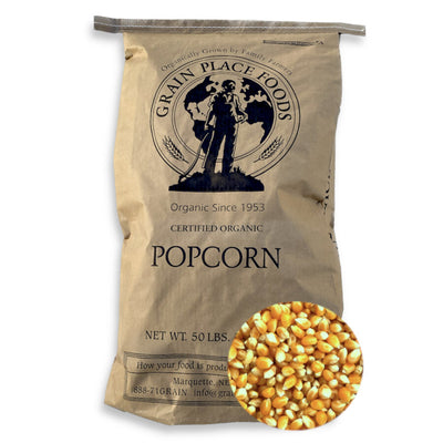 One 50 Pound Bag Of Organic Yellow Popcorn Kernels On A White Background