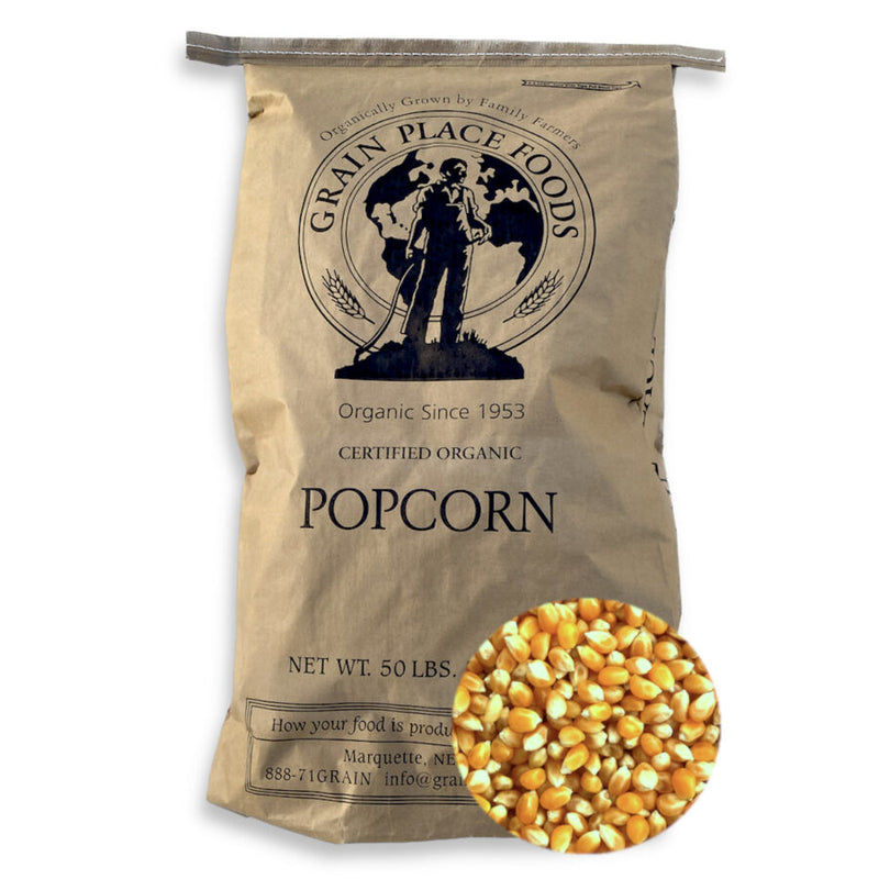 One 50 Pound Bag Of Organic Yellow Popcorn Kernels On A White Background