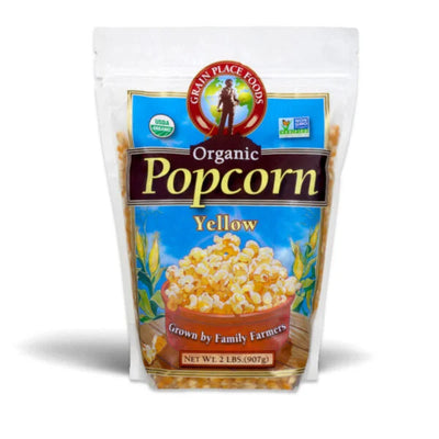One 5 Pound Bag Of Organic Yellow Popcorn Kernels On A White Background