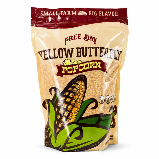 Bag of Free Day Yellow Butterfly Popcorn with corn illustration on a white background