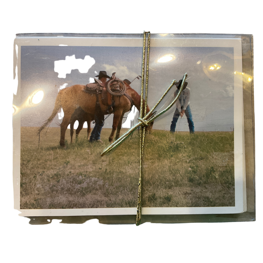 Image Of Two Cowboys Playing Golf In A Field Alongside A Grazing Horse 