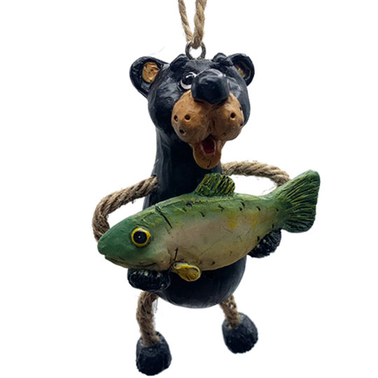 Bear ornament with jute-rope legs holding large fish