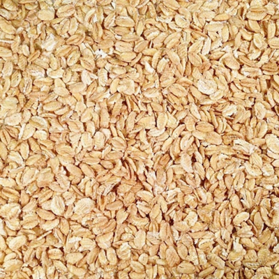 Pile Of Raw, Whole, Organic Rolled Kamut Wheat
