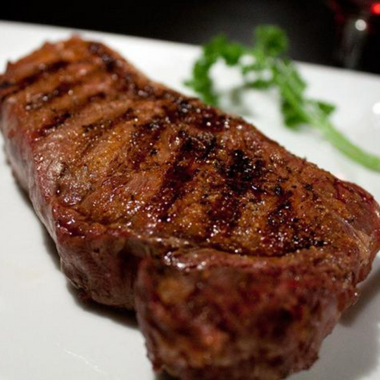 New York Strips | 4 - 10 oz. Nebraska Bison Steaks | 100% All Natural Bison Meat | Flavorful and Great For Grilling | The Perfect Steak : Tasty, Flavorful, & Tender | High Protein Cut Of Meat | Tender, Juicy Steak