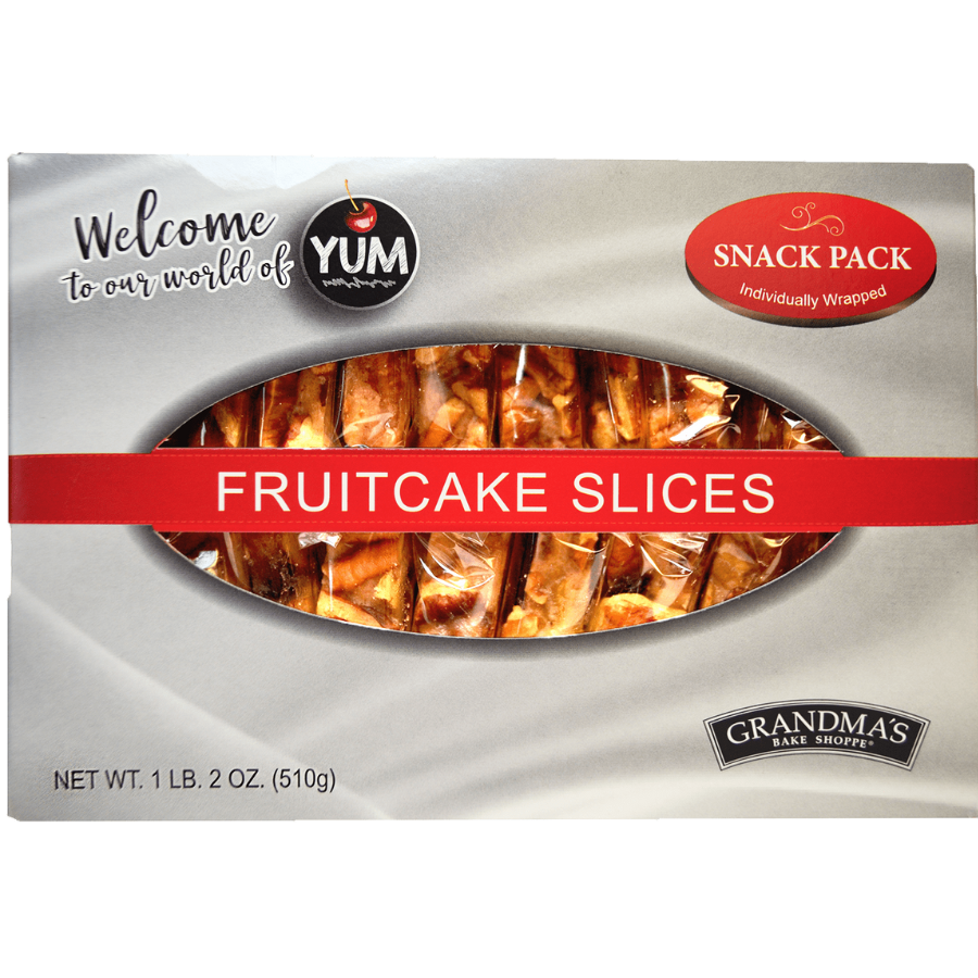 Packaging of traditional fruitcake slices branded by Beatrice Bakery, with a label showing the product name and the phrase 'Welcome to our world of YUM.'.