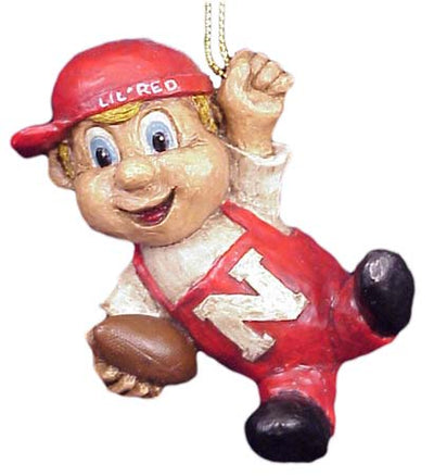 Li'l Red ornament, wearing red overall with big letter N and holding football on a white background