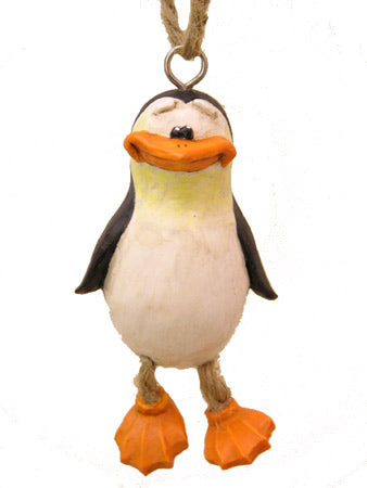 Penguin ornament with jute-rope legs on a white background