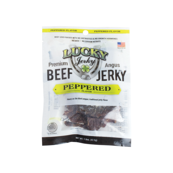 A package of Nebraska Star Beef brand Black Peppered Slab Beef Jerky, indicating 1.5 oz weight and premium Angus beef.